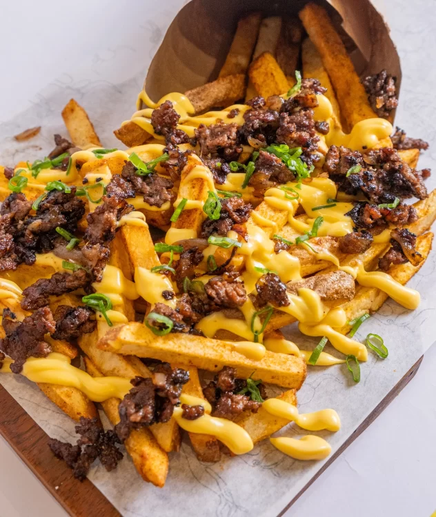 Papas Fritas Trufadas con Cheddar